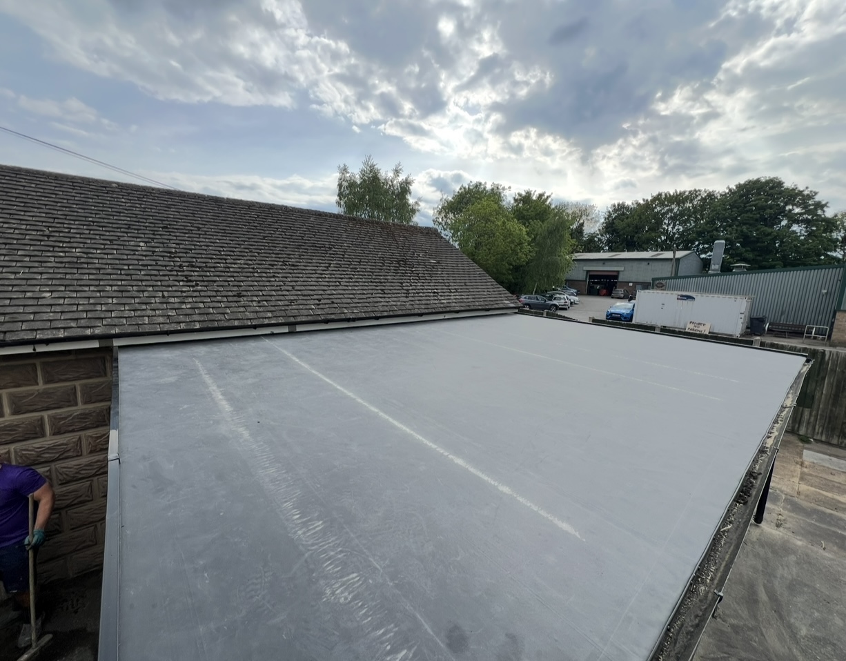 Flat roof installation — First Choice Roofing project